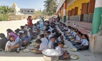 School Children having Meals
